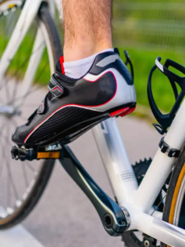 Male cyclist foot on bicycle pedal outdoor