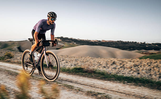 sportive gravel cyclist on the countryside