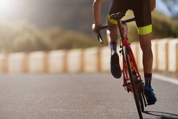 Road bike cyclist man cycling, athlete on a race cycle